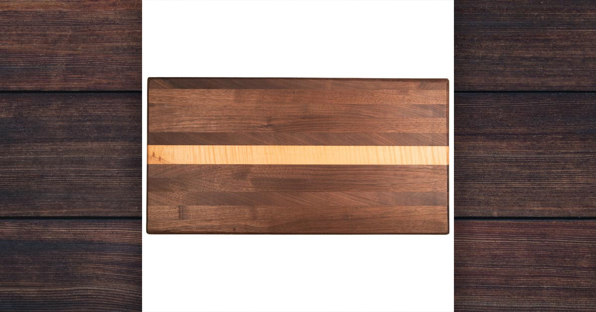 https://woodsmancoffeecompany.com/wp-content/uploads/2021/10/Cutting-Board-Walnut-with-Curly-Maple-Strip.jpg